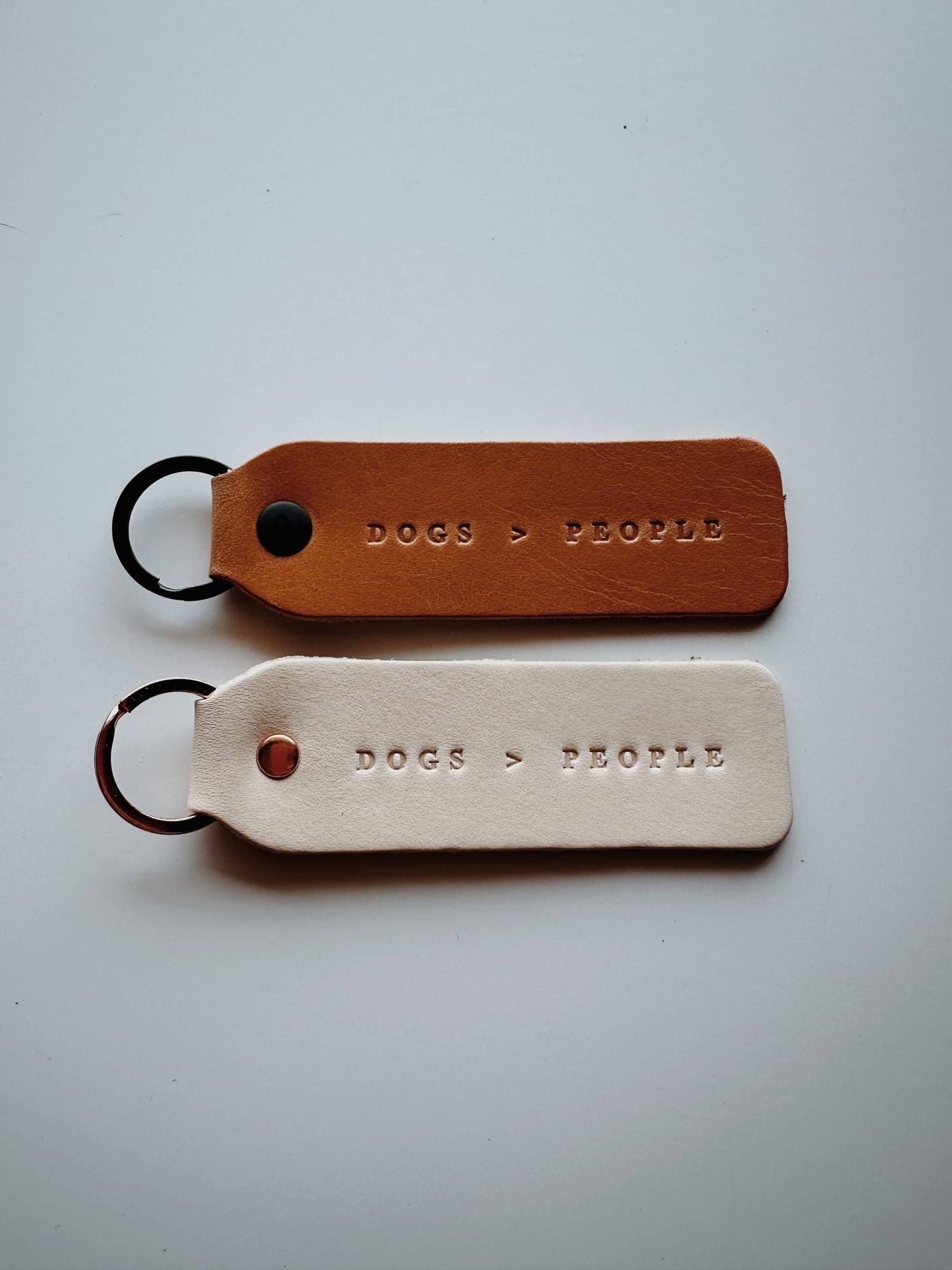 “Dogs > People” Keychain - Cream/Gold - Purpose + Passion Boutique