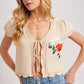 Embroidered Knit Cap Sleeve Open Front Tie Top