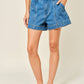 Medium Wash Mid Rise Flare Denim Shorts