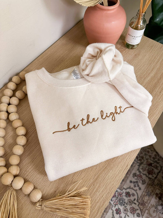 Be The Light Embroidered Sweatshirt - Purpose + Passion Boutique