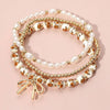 Brown/Gold Metal Bow Charm Pointed Ceramic Ball Pearl Bracelets (3pc) - Purpose + Passion Boutique