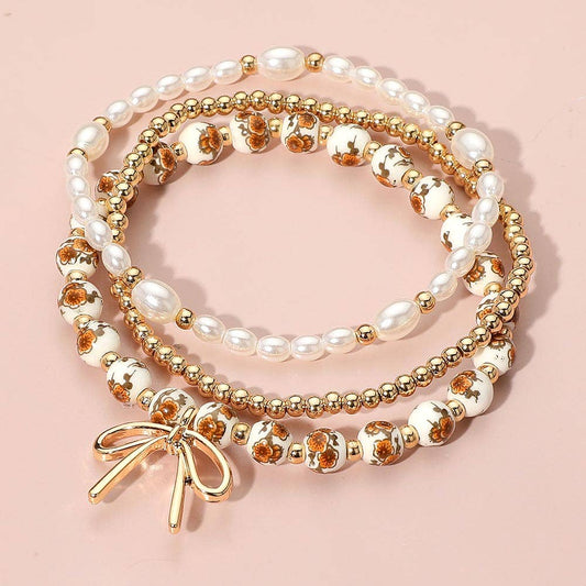 Brown/Gold Metal Bow Charm Pointed Ceramic Ball Pearl Bracelets (3pc) - Purpose + Passion Boutique