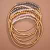 Neutral Coil Guitar String Bracelet Set