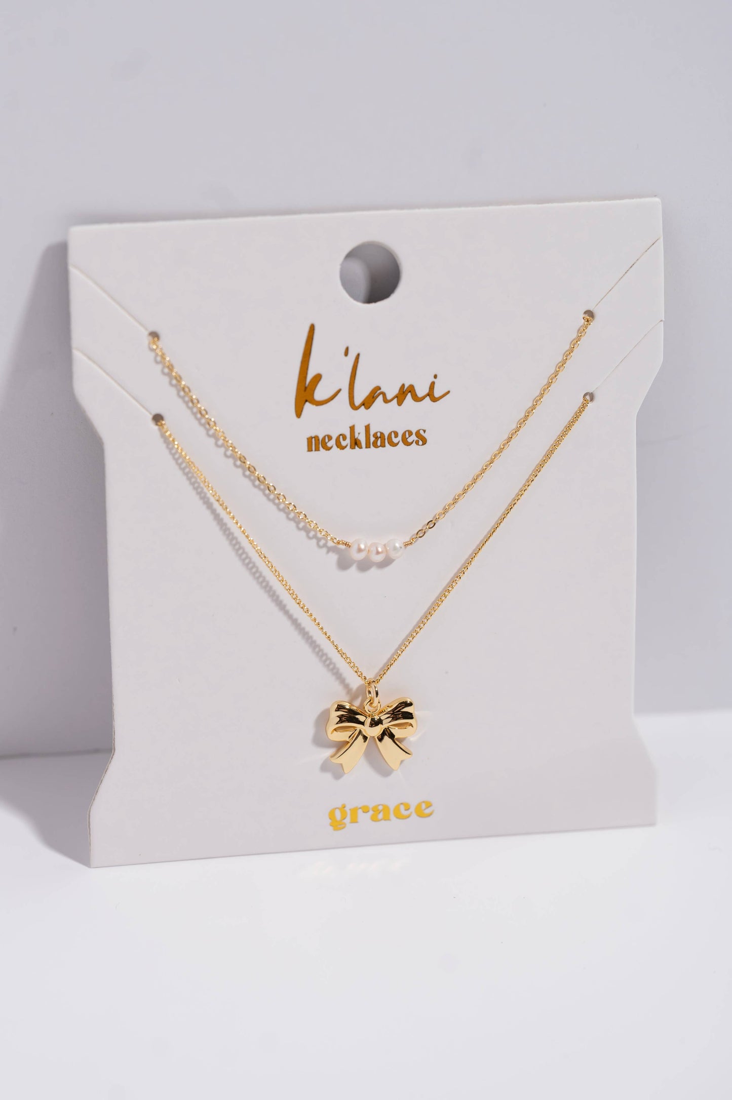 "Grace" Gold Bow with Pearl Accent Necklace Set