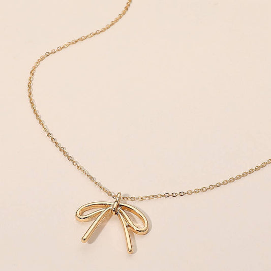 Gold Metal Bow Pendant Necklace - Purpose + Passion Boutique