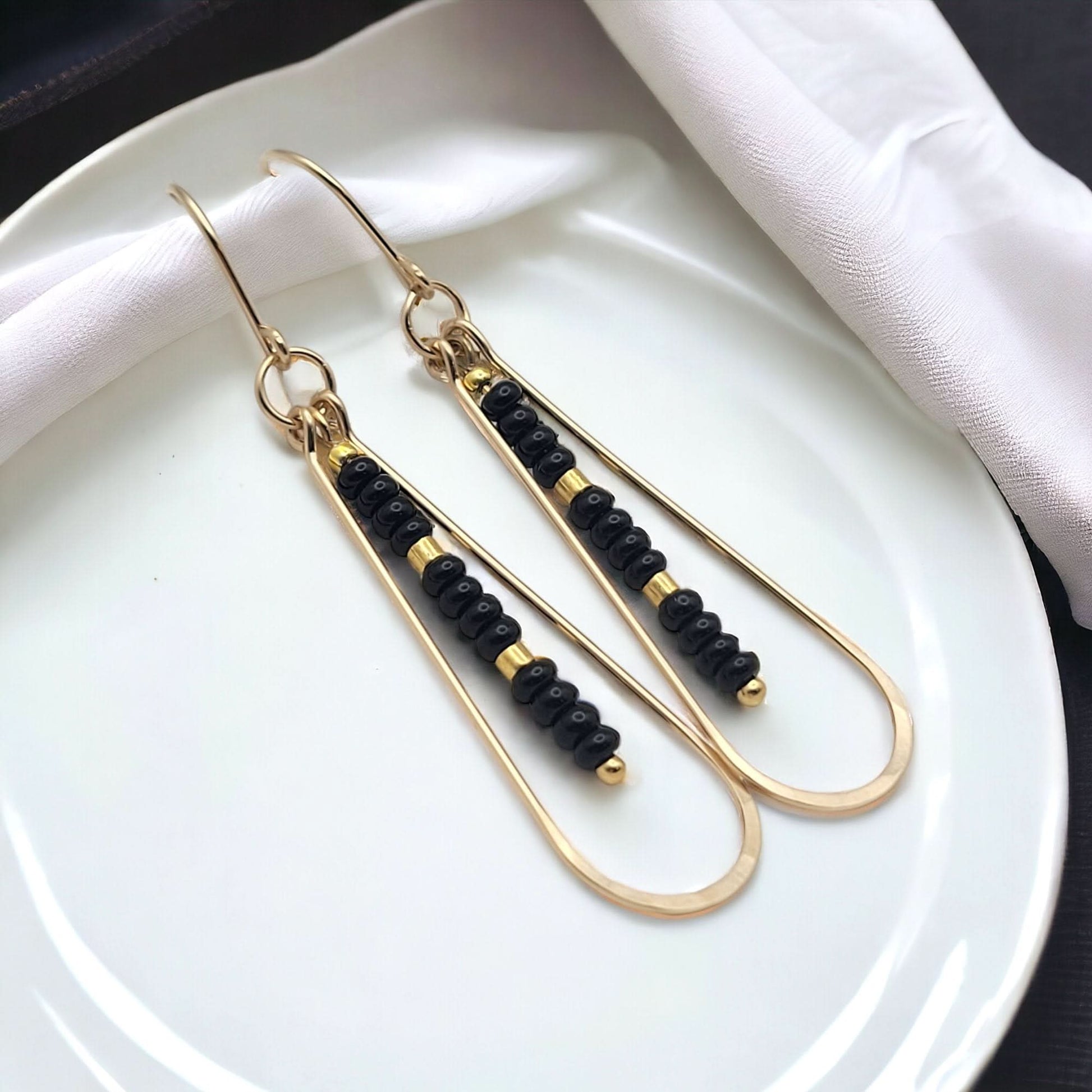 Long Gold Teardrop Hoop Earrings with Black Seed Beads - Purpose + Passion Boutique