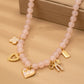 Lt. Pink Beaded Charm Necklace - Purpose + Passion Boutique