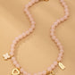 Lt. Pink Beaded Charm Necklace - Purpose + Passion Boutique